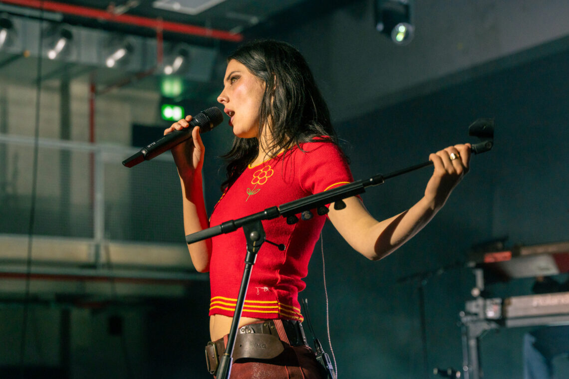 Wolf Alice singer Ellie Rowell taking the stage in Hamburg.